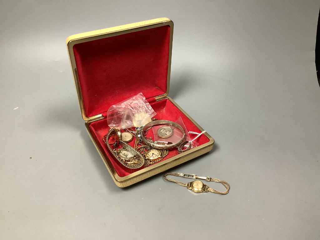 A lady’s 9ct gold watch on 9ct strap, gross 11.5 grams and other minor watches and jewellery.
